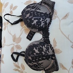 VS cream with black lace and flora pattern covering